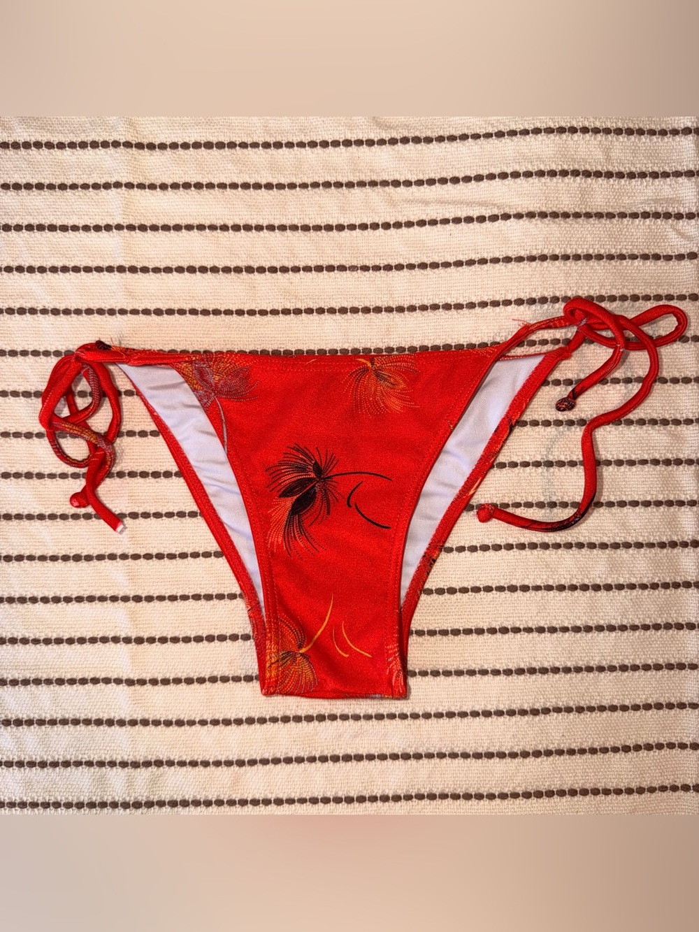 O'Neill Bright Orange Floral Bikini Bottom with tie sides